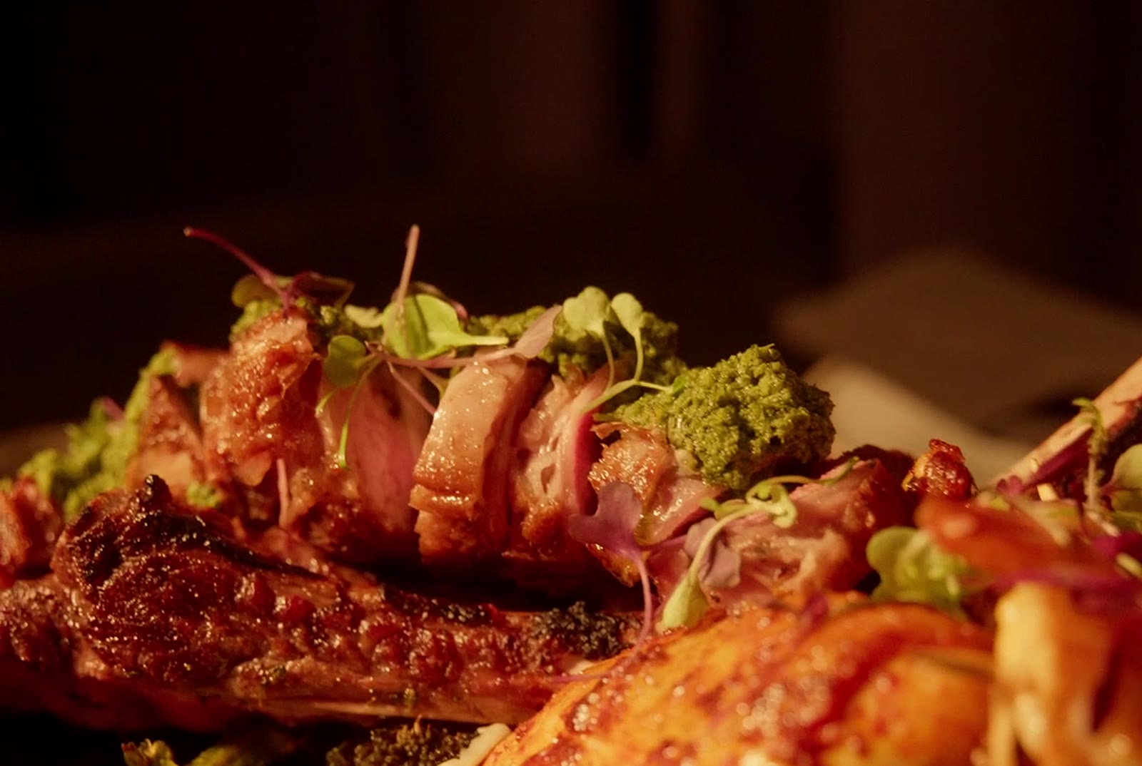 Tomahawk platter with guajillo chicken and chipotle prawns at Monarca, Gastown